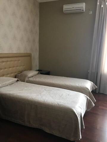 Фото номера Двухместный номер с 2 отдельными кроватями и душем Гостиница Luxor г. Ессентуки 11