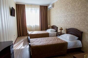 Фото номера Двухместный номер с 2 отдельными кроватями Гостиница Отель Resort  г. Ессентуки 2