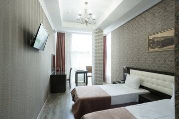 Фото номера Номер улучшенный премиум с 1 двуспальной кроватью Гостиница Verona Hotel г. Ессентуки 5