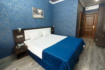 Фото номера Номер улучшенный премиум с 1 двуспальной кроватью Гостиница Verona Hotel г. Ессентуки 3