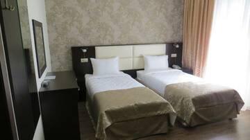 Фото номера Номер стандарт с 2 односпальными кроватями Гостиница Verona Hotel г. Ессентуки 2